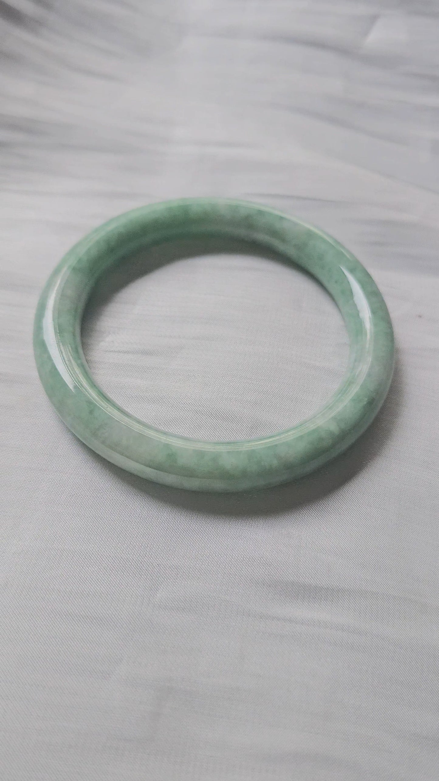 GUARDIAN | JAYDE Untreated Grade-A Jadeite Bangle in Pastel Green with Dark Green (54.5mm Round)