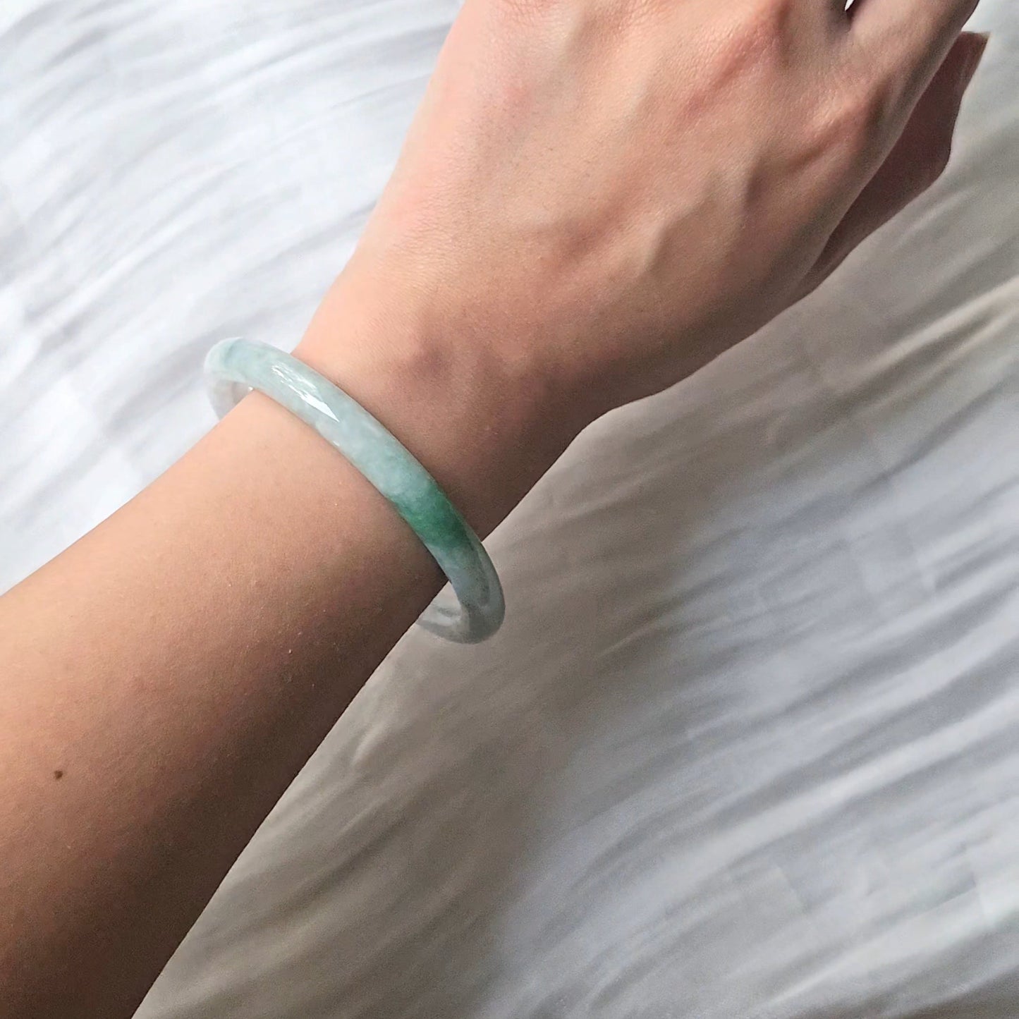 GUARDIAN | JAYDE Natural Grade-A Jadeite Bangle in Dreamy White with patches of dark green (56.1mm Round)