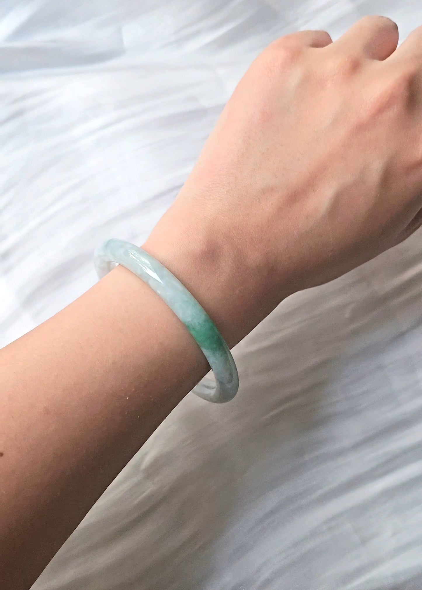 GUARDIAN | JAYDE Natural Grade-A Jadeite Bangle in Dreamy White with patches of dark green (56.1mm Round)