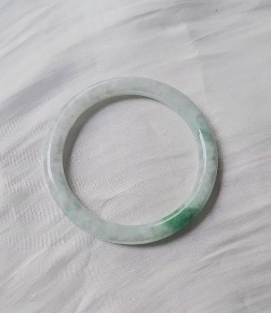 GUARDIAN | JAYDE Natural Grade-A Jadeite Bangle in Dreamy White with patches of dark green (56.1mm Round)