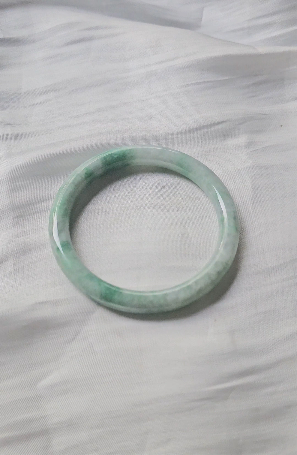 GUARDIAN | JAYDE Untreated Grade-A Jadeite Bangle in Pastel Green with Dark Green (56.5mm Round)