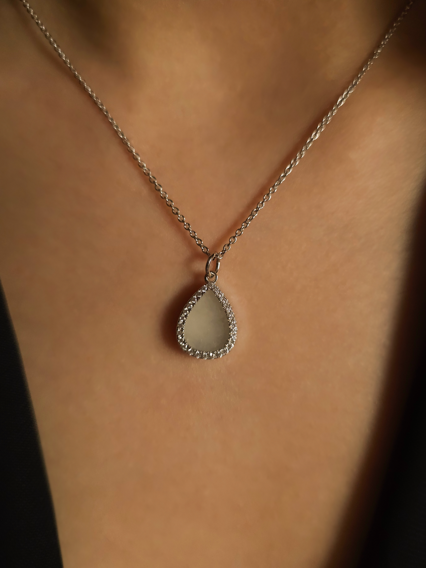 minimalistic modern simple raindrop shaped white jadeite jade sterling silver palladium necklace 