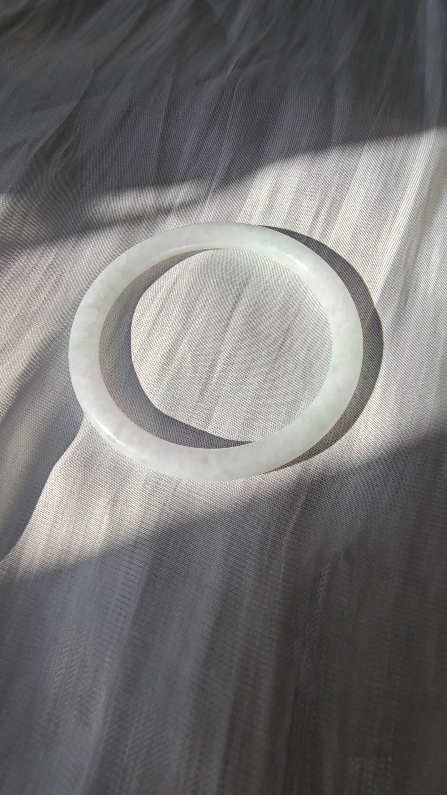 GUARDIAN | JAYDE Natural Grade-A Jadeite Bangle in Misty White with Light Green Patterns (55.6mm Thin Round)