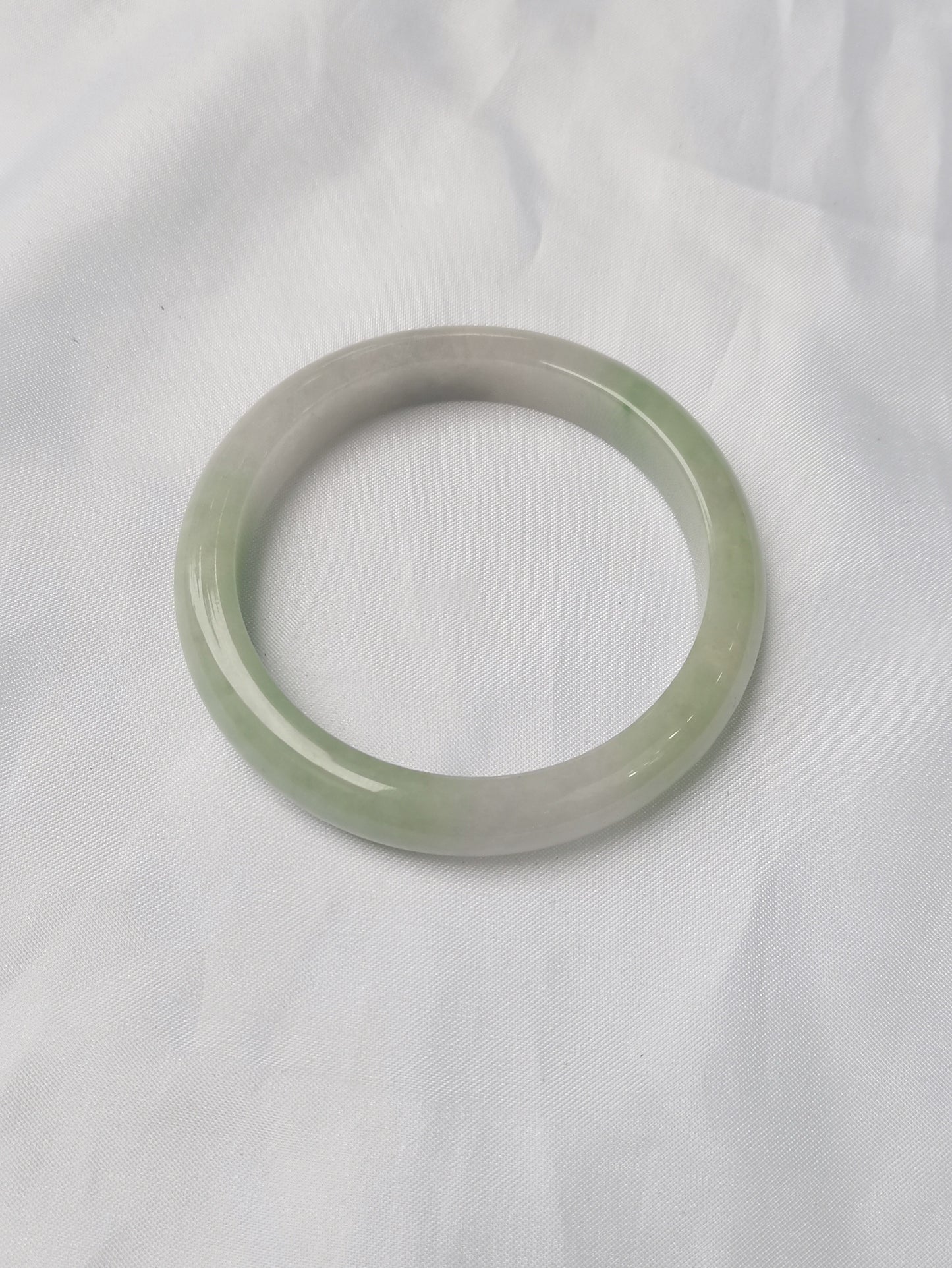 GUARDIAN | JAYDE Untreated Grade-A Jadeite Bangle in Pastel Green and Light Purple undertone (56.5mm Half Round)