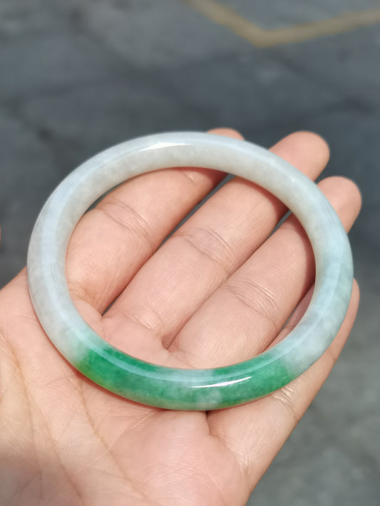 GUARDIAN | JAYDE Untreated Grade-A Jadeite Bangle in Dreamy White with patches of Vibrant Green (55.3mm Round)