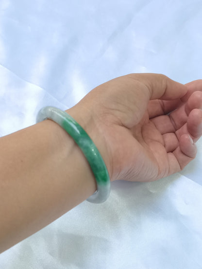 GUARDIAN | JAYDE Untreated Grade-A Jadeite Bangle in Dreamy White with patches of Vibrant Green (55.3mm Round)