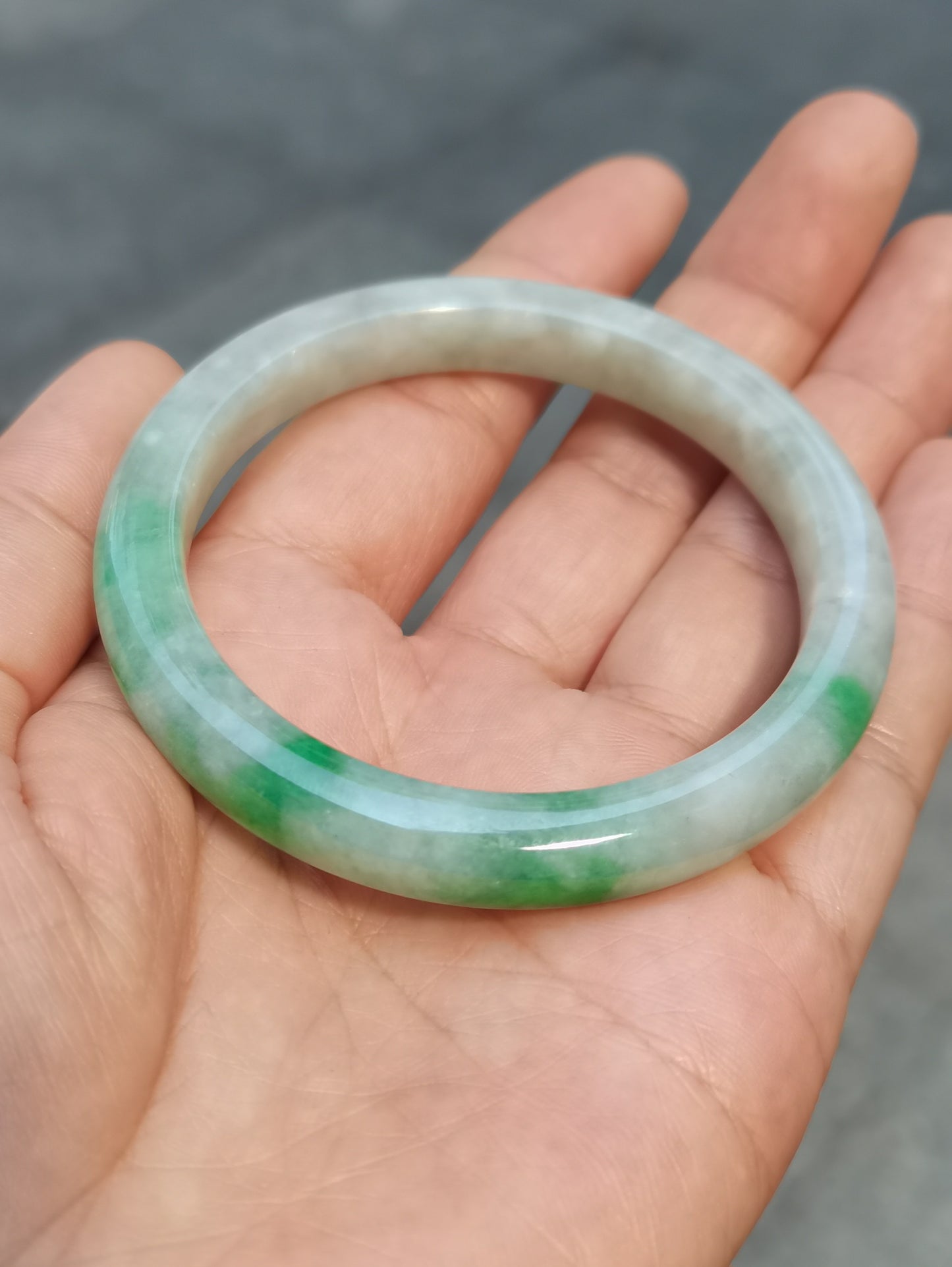 GUARDIAN | JAYDE Untreated Grade-A Jadeite Bangle in Dreamy White with patches of Vibrant Green (52.2mm Round)