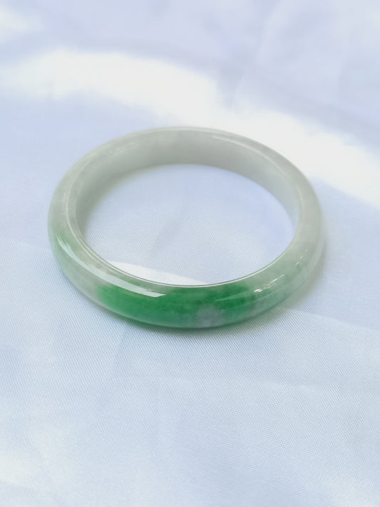 GUARDIAN | JAYDE Untreated Grade-A Jadeite Bangle in Dreamy White with patches of Vibrant Green (52.5mm Half Round)