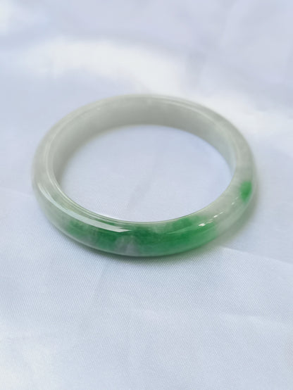 GUARDIAN | JAYDE Untreated Grade-A Jadeite Bangle in Dreamy White with patches of Vibrant Green (52.5mm Half Round)