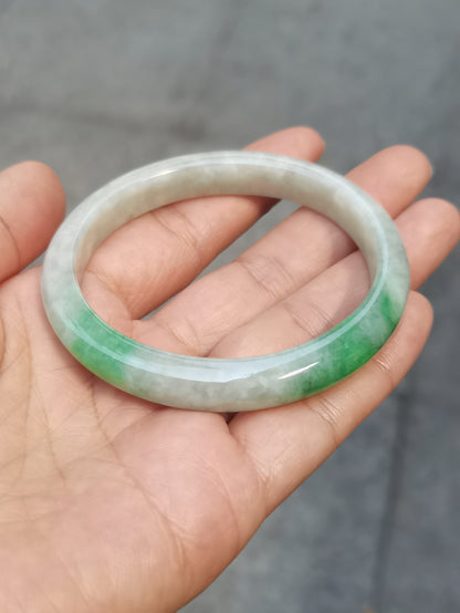 GUARDIAN | JAYDE Untreated Grade-A Jadeite Bangle in Dreamy White with patches of Vibrant Green (56.1mm Oval)