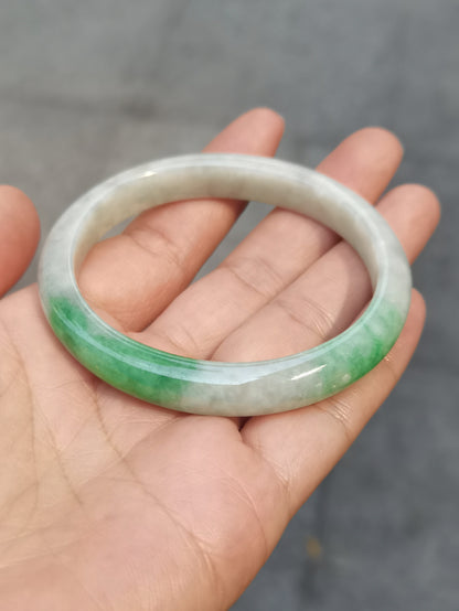 GUARDIAN | JAYDE Untreated Grade-A Jadeite Bangle in Dreamy White with patches of Vibrant Green (56.1mm Oval)