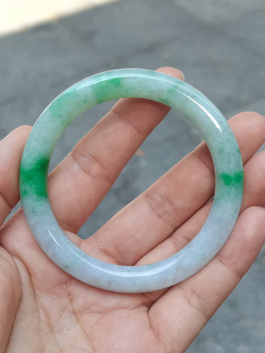 GUARDIAN | JAYDE Untreated Grade-A Jadeite Bangle in Dreamy White with patches of Vibrant Green (54.4mm Round)
