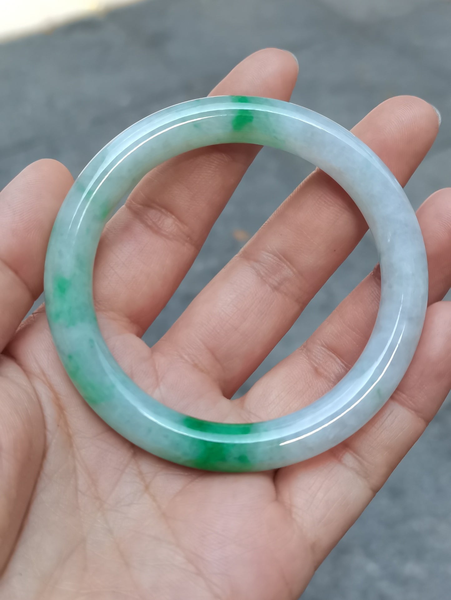 GUARDIAN | JAYDE Untreated Grade-A Jadeite Bangle in Dreamy White with patches of Vibrant Green (54.4mm Round)