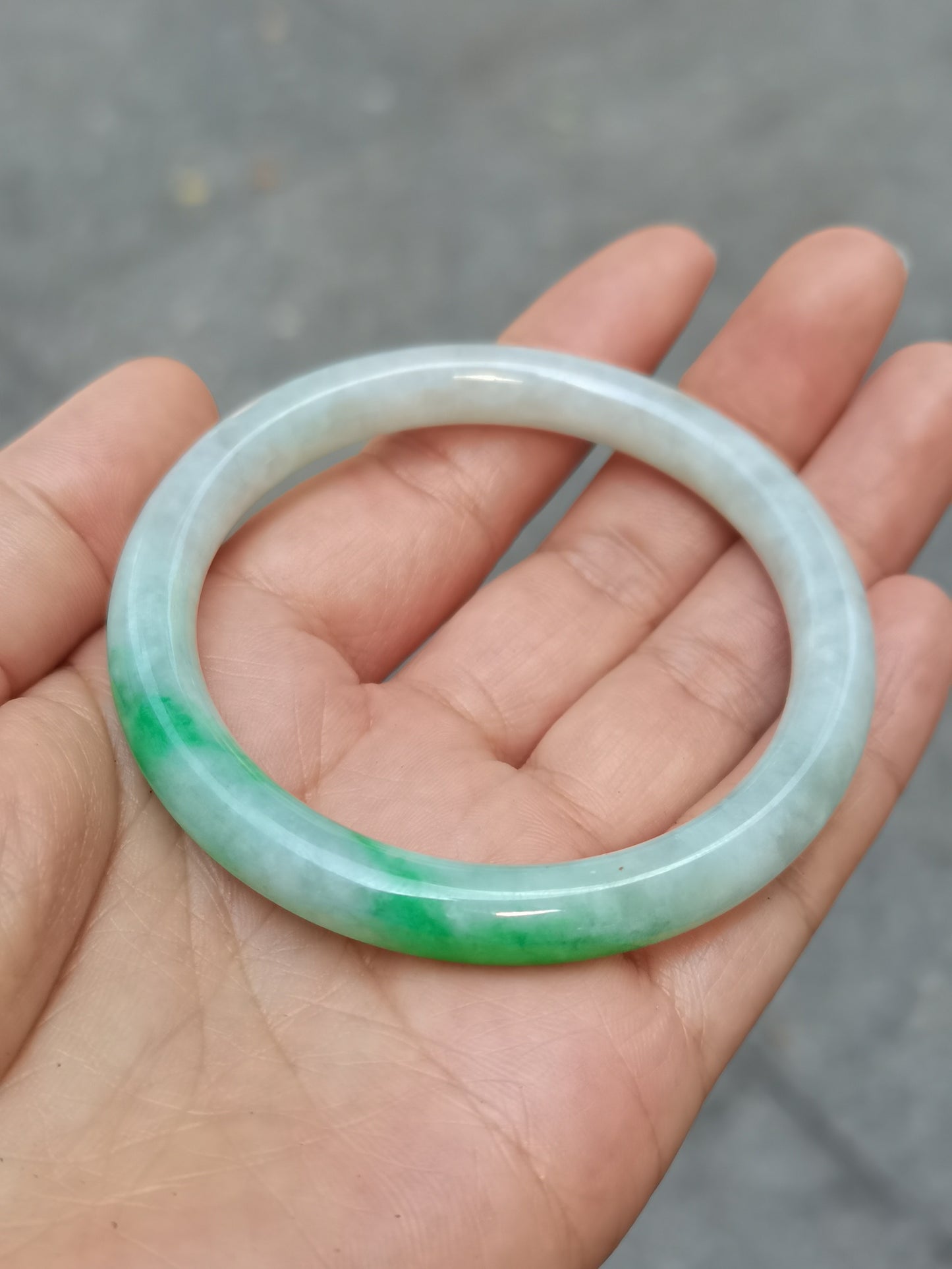 GUARDIAN | JAYDE Untreated Grade-A Jadeite Bangle in Dreamy White with patches of Vibrant Green (53.7mm Round)