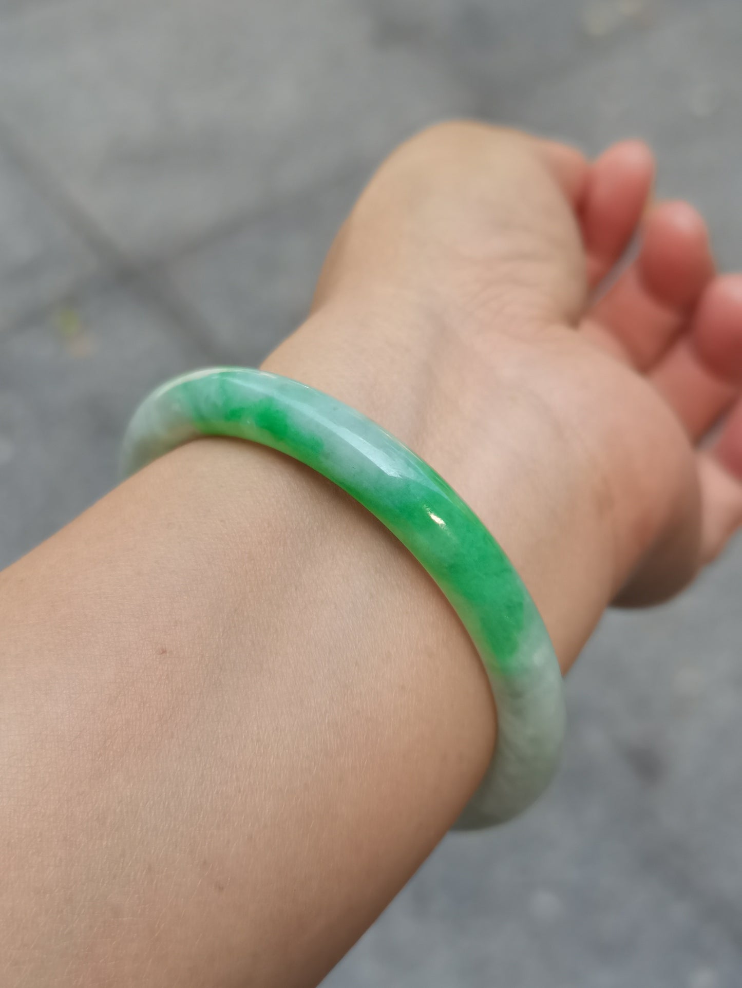 GUARDIAN | JAYDE Untreated Grade-A Jadeite Bangle in Dreamy White with patches of Vibrant Green (53.7mm Round)