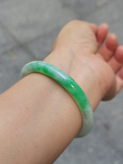 GUARDIAN | JAYDE Untreated Grade-A Jadeite Bangle in Dreamy White with patches of Vibrant Green (53.7mm Round)