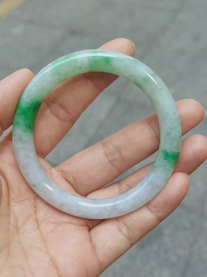 GUARDIAN | JAYDE Untreated Grade-A Jadeite Bangle in Dreamy White with patches of Vibrant Green (54.4mm Round)
