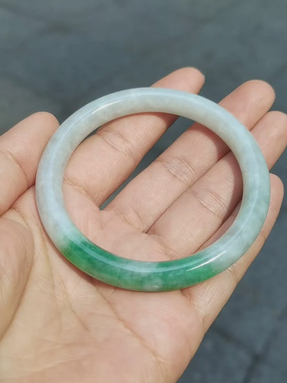 GUARDIAN | JAYDE Untreated Grade-A Jadeite Bangle in Dreamy White with patches of Vibrant Green (55.3mm Round)